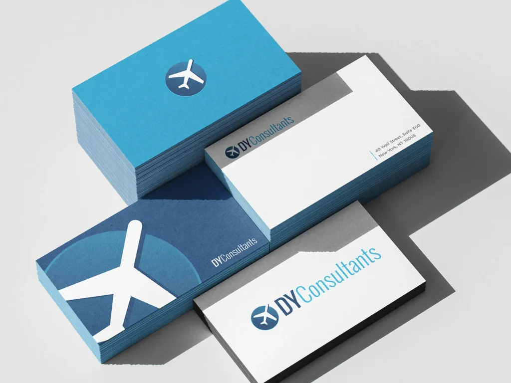 A stack of branded business cards with a blue minimalist airplane logo, crafted for a growing consulting firm on 16pt premium white stock.