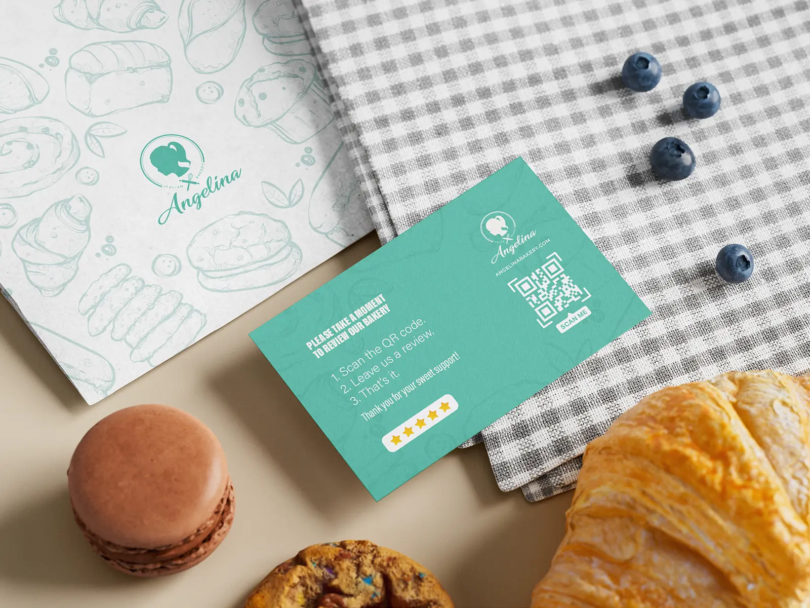 Custom restaurant review card with a QR code and brand logo, printed on 17pt textured stock and styled with macarons on a checkered surface.