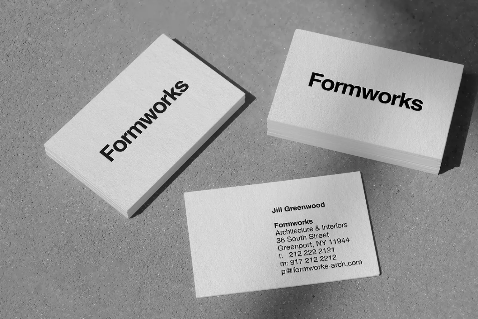 Modern letterpress cards for Formworks featuring bold black typography on bright white stock, expertly produced for our New York design partners.