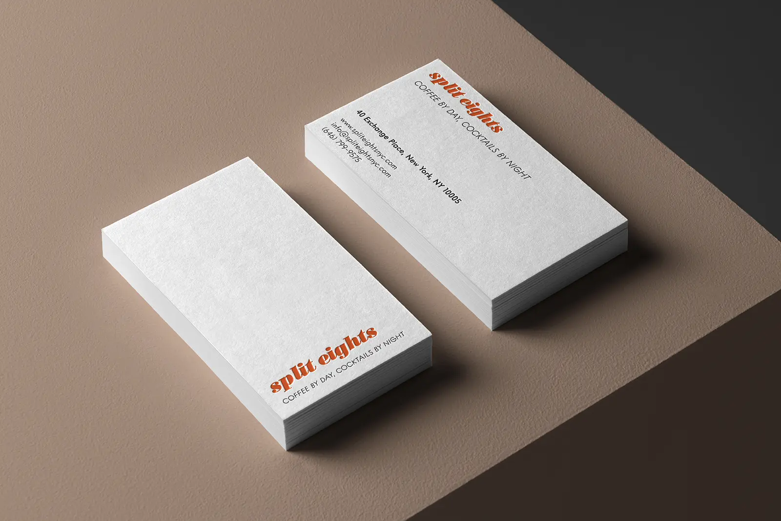 Thick letterpress business cards for Split Eight featuring bold red ink and crisp impressions, custom-made in our NYC studio for a classic, professional look.