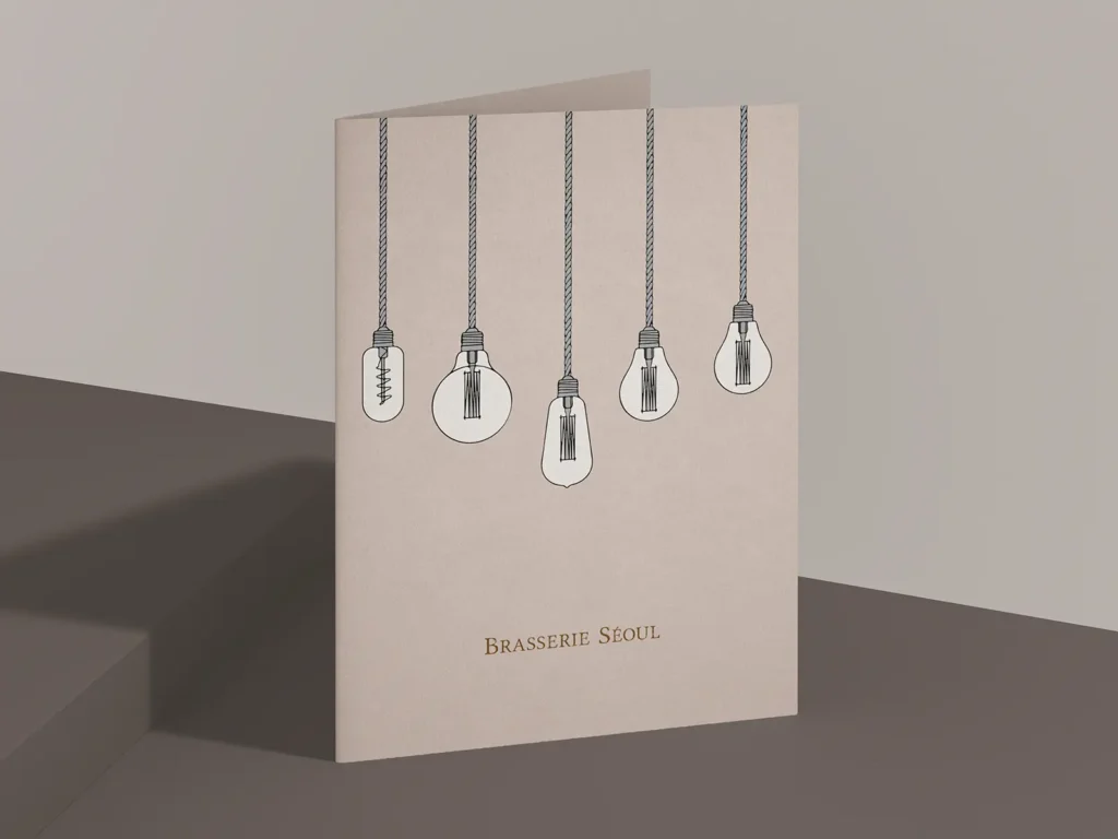 Custom restaurant menu printed on 130lb smooth cardstock at our NYC print shop, featuring a minimalist hanging bulb illustration.