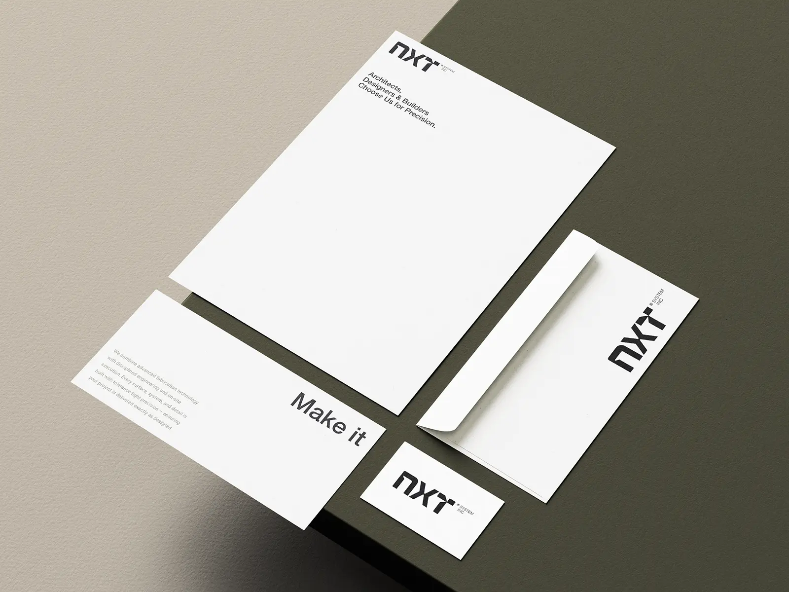 Integrated corporate stationery set including business cards, 24lb bond letterheads and matching envelopes, designed and printed at our NYC print shop for high-growth architectural firms.