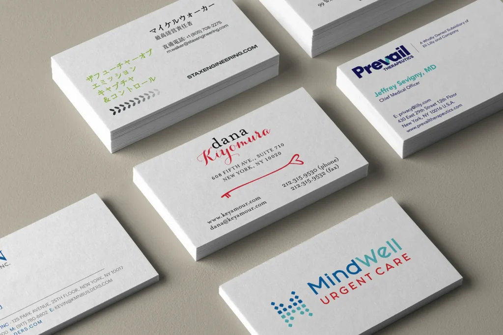 A collection of premium rush business cards, including Dana Kiyomura and MindWell Urgent Care, serving our customers in Brooklyn with quick 24-hour printing.