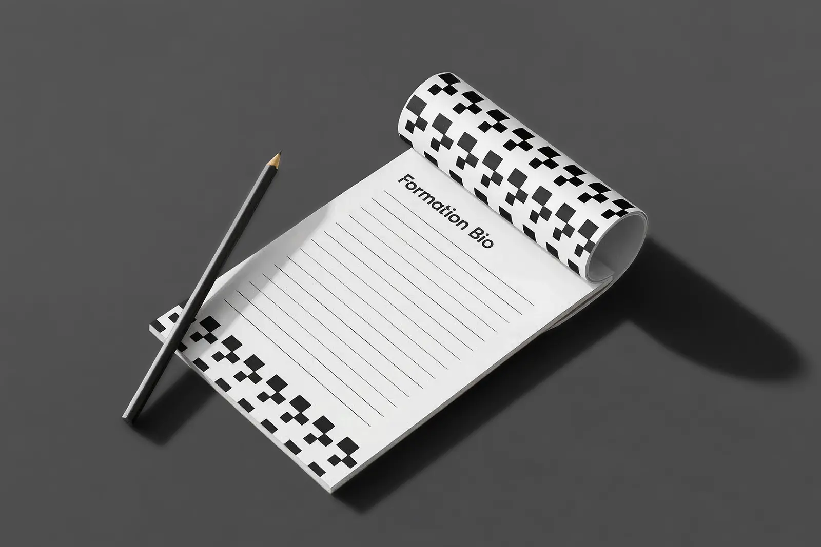 Branded office notepad for Formation Bio with a unique checkered pattern detail, printed on premium 70lb stock at our Manhattan location for local businesses and corporate teams.