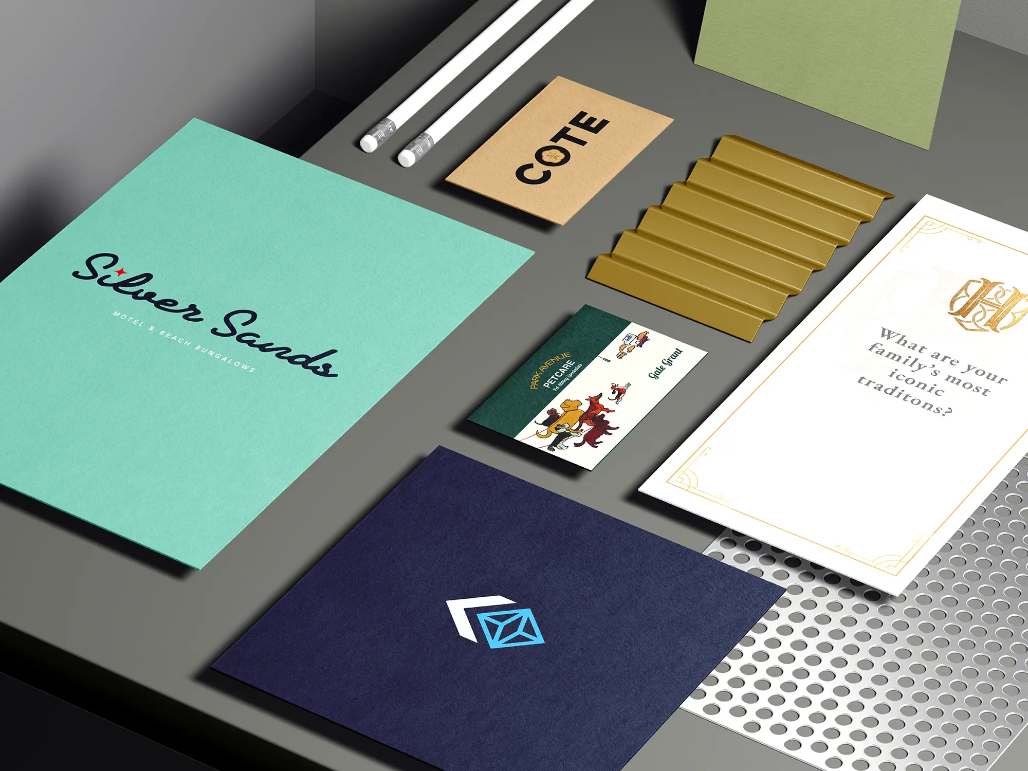 A collection of premium brand assets including postcards, business cards and metallic gold foil cards, part of a dedicated corporate partnership managed at our Manhattan studio.